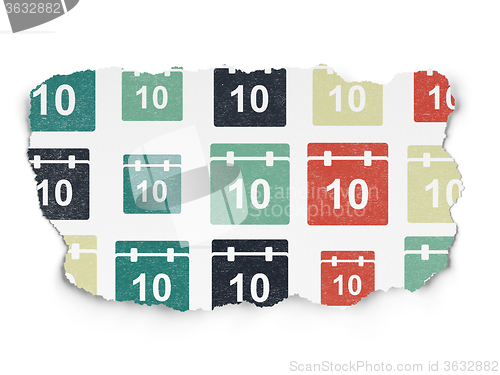 Image of Time concept: Calendar icons on Torn Paper background