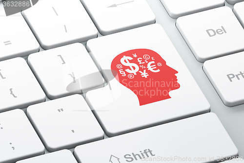 Image of Studying concept: Head With Finance Symbol on computer keyboard background
