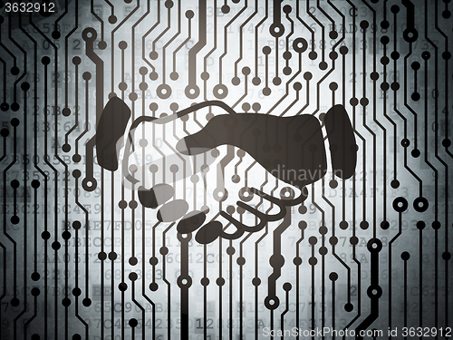 Image of Business concept: circuit board with Handshake