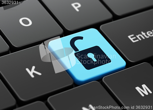 Image of Data concept: Opened Padlock on computer keyboard background