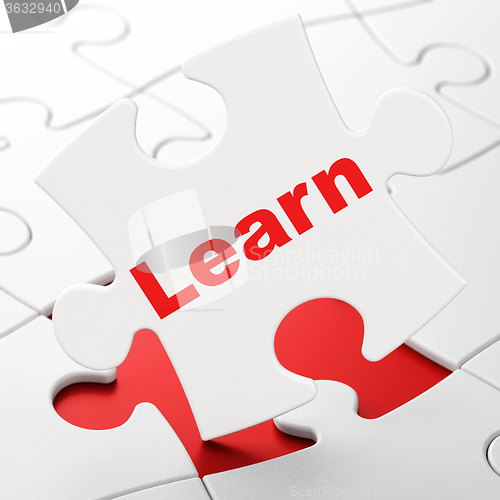 Image of Education concept: Learn on puzzle background
