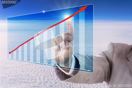 Image of Touching A Growth Trend Arrow In A Bar Chart