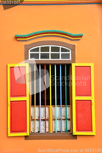 Image of Colorful windows and details on a colonial house in Little India