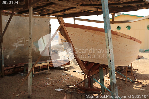 Image of Boat under construction in the shade_6183