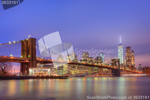 Image of Brooklyn bridge at dusk, New York City.