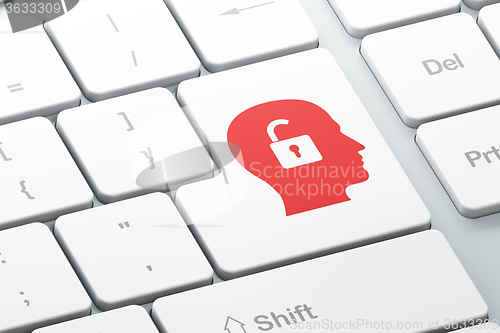 Image of Finance concept: Head With Padlock on computer keyboard background