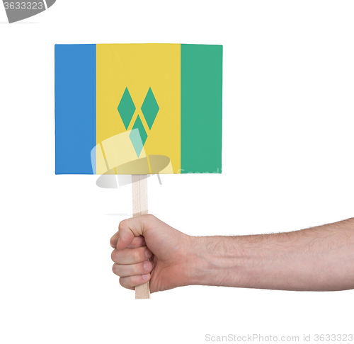 Image of Hand holding small card - Flag of Saint Vincent and the Grenadin