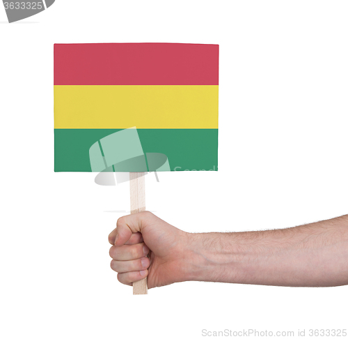 Image of Hand holding small card - Flag of Bolivia