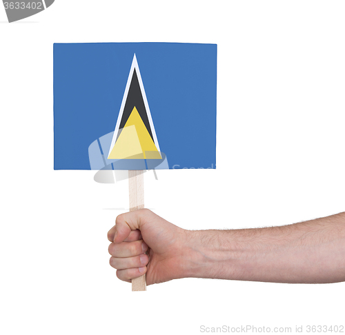 Image of Hand holding small card - Flag of Saint Lucia