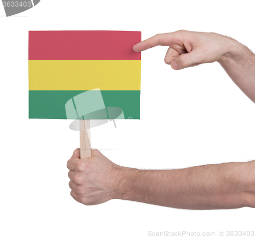 Image of Hand holding small card - Flag of Bolivia