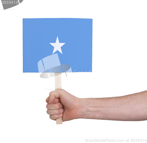 Image of Hand holding small card - Flag of Somalia