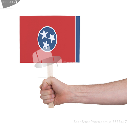 Image of Hand holding small card - Flag of Tennessee