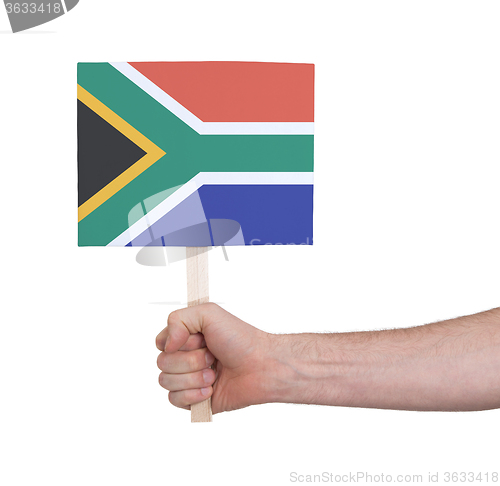 Image of Hand holding small card - Flag of South Africa