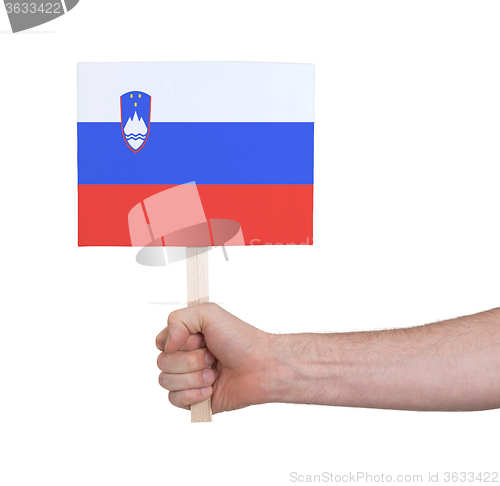 Image of Hand holding small card - Flag of Slovenia