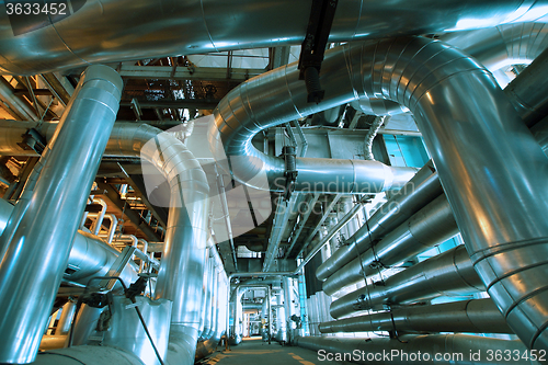 Image of Industrial zone, Steel pipelines and equipment in blue tone