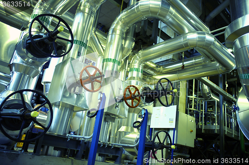 Image of Equipment, cables and piping as found inside of a modern industr