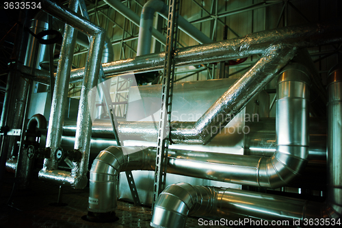 Image of Industrial zone, Steel pipelines, valves and tanks