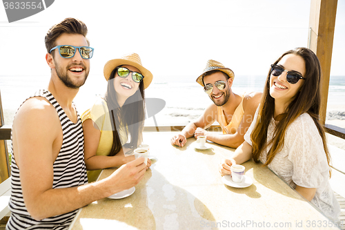 Image of Friends at the beach bar