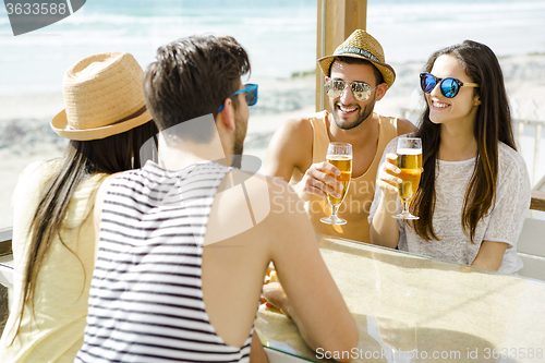 Image of Friends at the beach bar