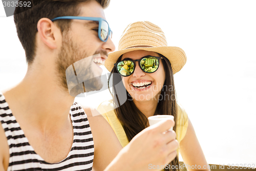 Image of Friends at the beach bar