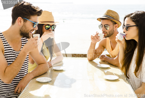 Image of Friends at the beach bar