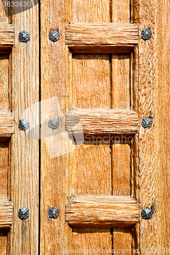 Image of door    in italy old ancian   traditional    nail