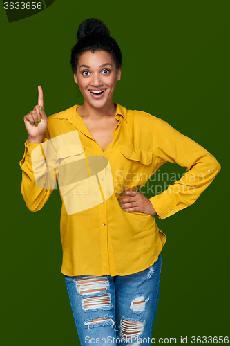 Image of Woman pointing her finger up