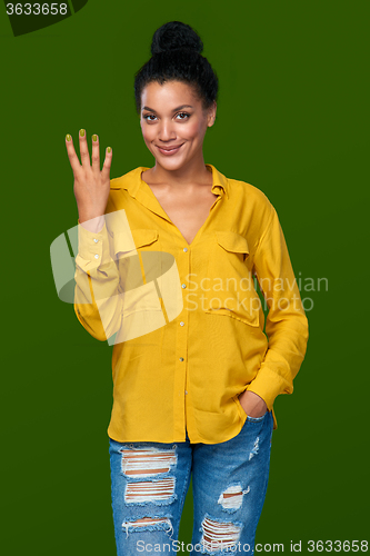 Image of Woman showing four fingers