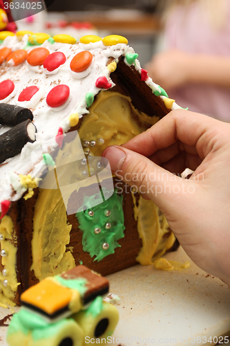 Image of Decorating gingerbread house