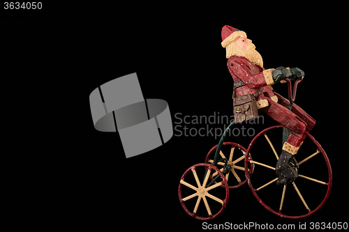 Image of santa on bike