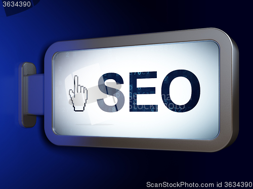 Image of Web development concept: SEO and Mouse Cursor on billboard background