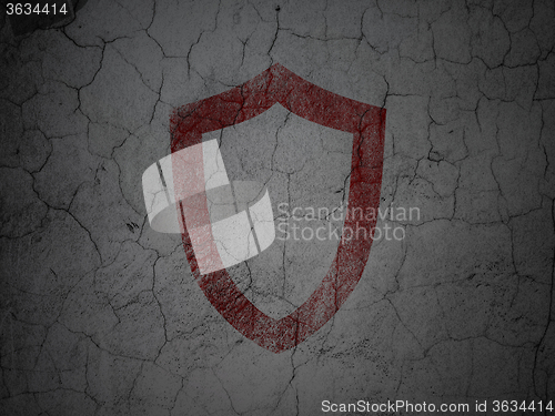 Image of Security concept: Contoured Shield on grunge wall background