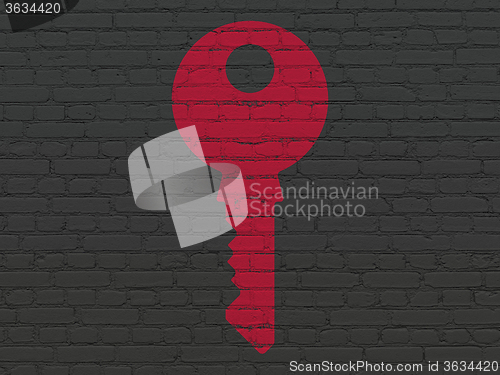 Image of Safety concept: Key on wall background