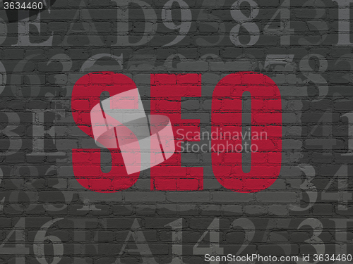 Image of Web development concept: SEO on wall background