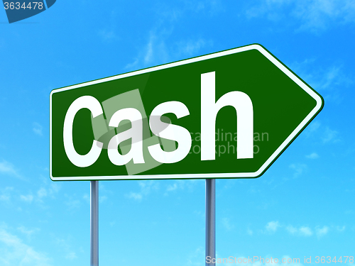 Image of Currency concept: Cash on road sign background
