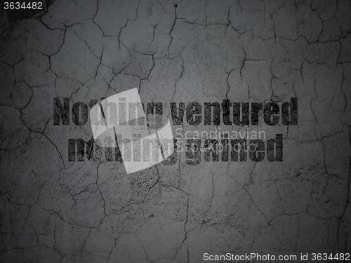 Image of Finance concept: Nothing ventured Nothing gained on grunge wall background