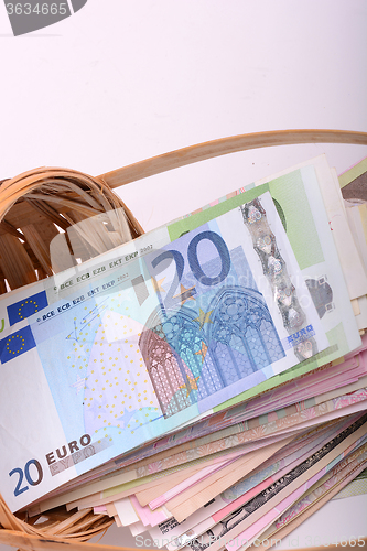 Image of european money on wooden basket