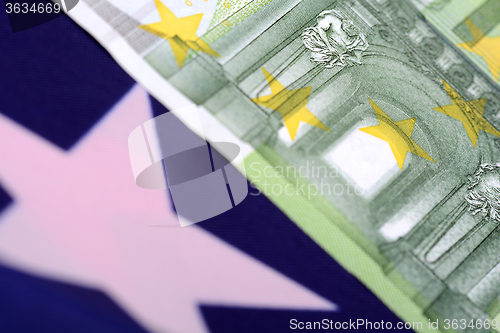 Image of european money on american flag