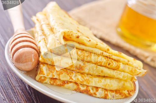 Image of pancakes with honey