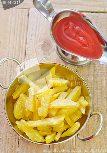 Image of potato with tomato sauce