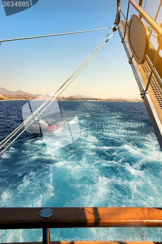 Image of Sailboat near coastline