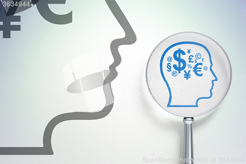 Image of Business concept:  Head With Finance Symbol with optical glass on digital background