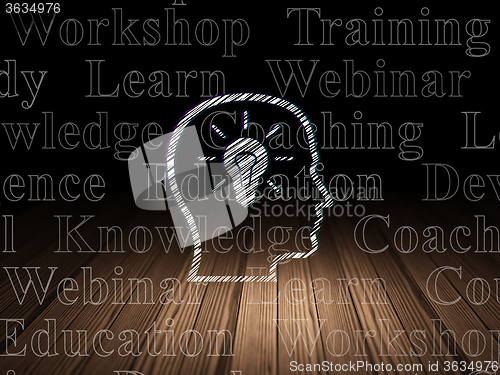 Image of Studying concept: Head With Lightbulb in grunge dark room