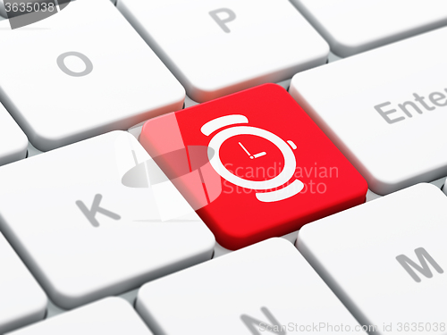 Image of Time concept: Hand Watch on computer keyboard background