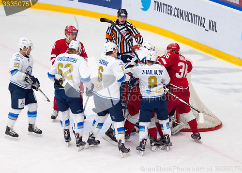 Image of Keaton Ellerby (6) and Talgat Zhailauov (8) attack