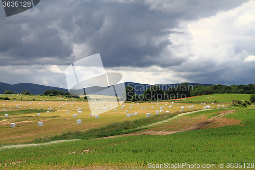 Image of czech country with straw bales