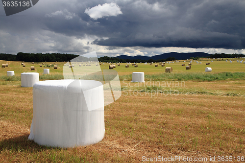 Image of czech country with straw bales