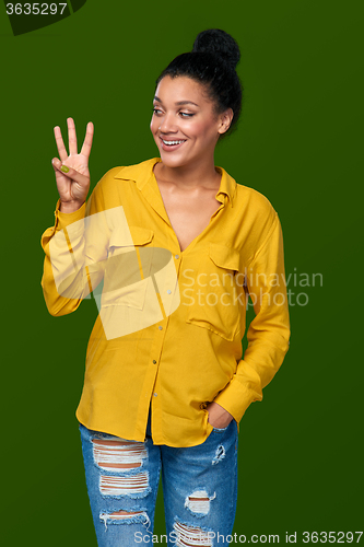 Image of Woman showing three fingers