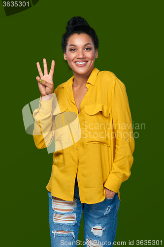 Image of Woman showing three fingers