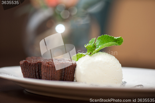 Image of chocolate cake with ice cream